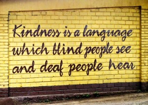 Kindness message on a wall in Tanzania. A child in Kenya.